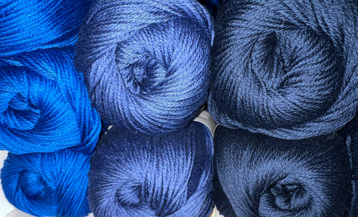 Superfine Italian merino wool yarn spools used in Noyac Knits knitwear