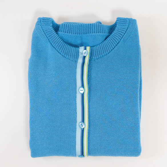 close up of french blue ribbon sweater with blue and green striped ribbon trim and light blue buttons