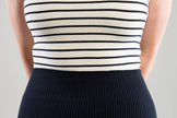 close up of waist line of Noyac Knits navy ribbed knit midi skirt in stretch, environmentally sustainable ecoviscose