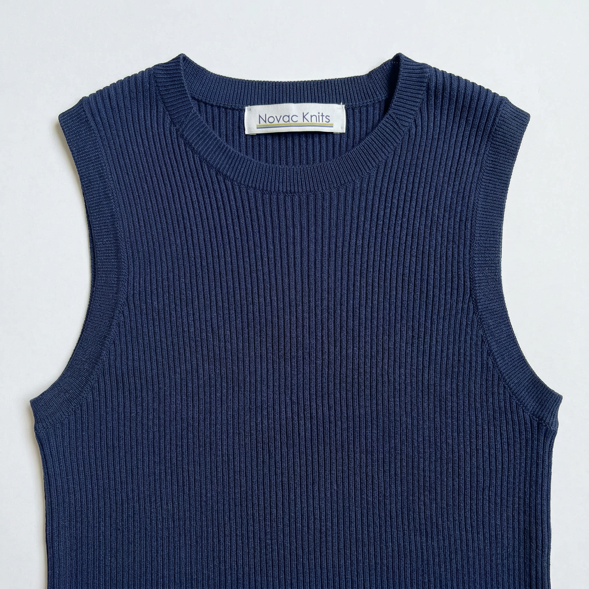Noyac Knits navy ribbed knit crew neck sleeveless sweater in environmentally sustainable ecoviscose on a white  background 