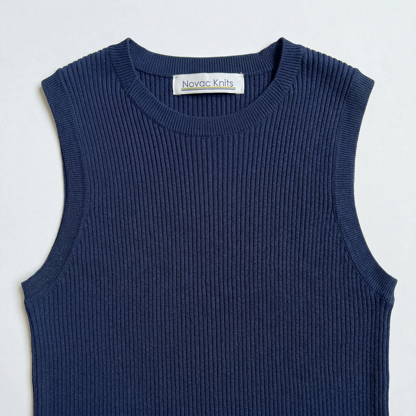Noyac Knits navy ribbed knit crew neck sleeveless sweater in environmentally sustainable ecoviscose on a white  background 