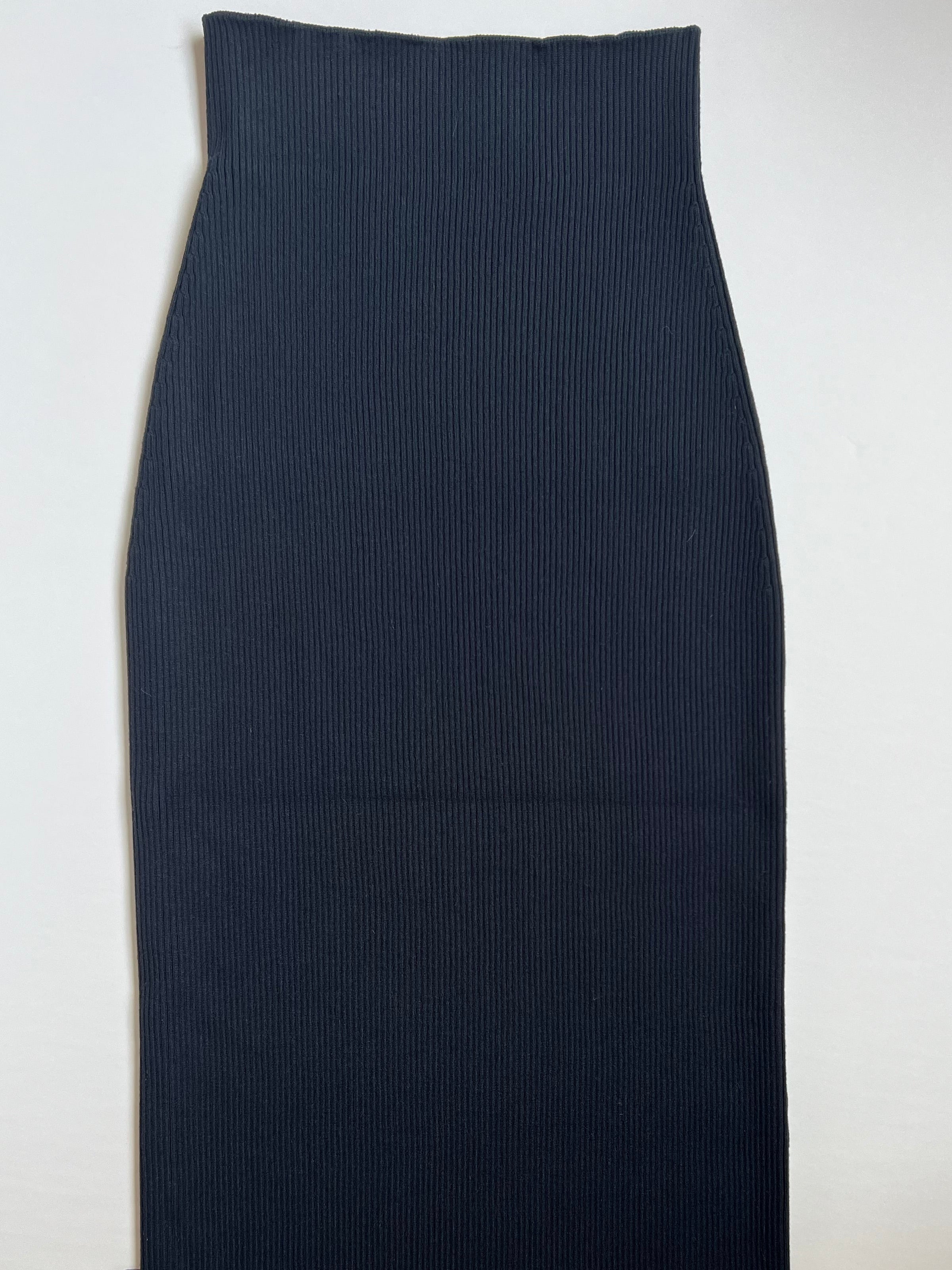 Lay flat image of Noyac Knits navy stretch ribbed knit midi skirt  in environmentally sustainable ecoviscose on a white background