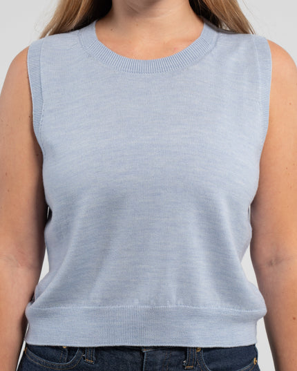 Close up of Noyac Knits baby blue crop crew neck sleeveless sweater in soft, premium merino